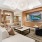 a living room with a large chandelier and a couch