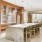 a kitchen with a large table and chairs