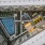 an aerial view  of a courtyard and pool