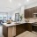 a kitchen with wooden cabinets