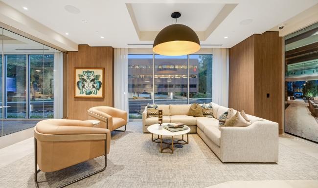 a lounge with a large couch