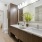 a bathroom with a large mirror